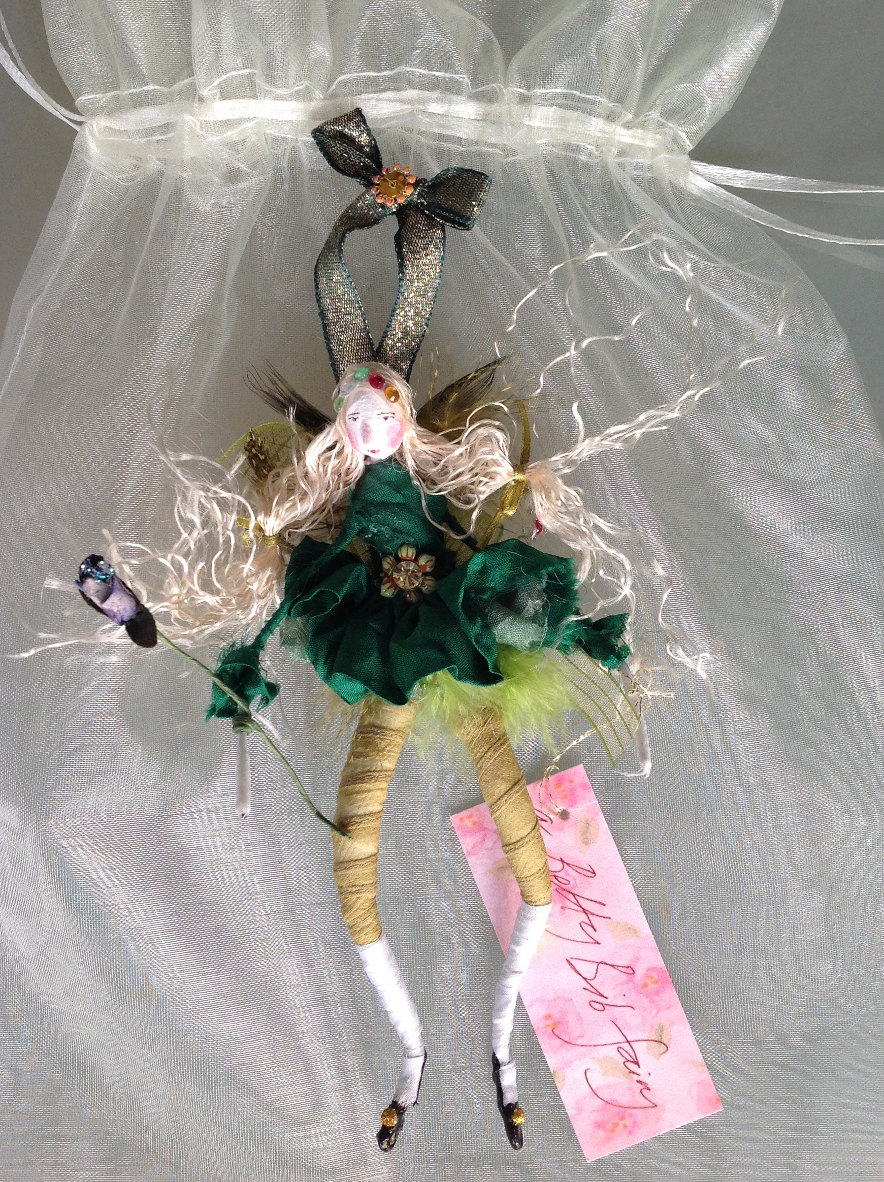15cm high fairy with silk tutu, feather wings and jewel on her waistband. £28 plus £3.50 p&p