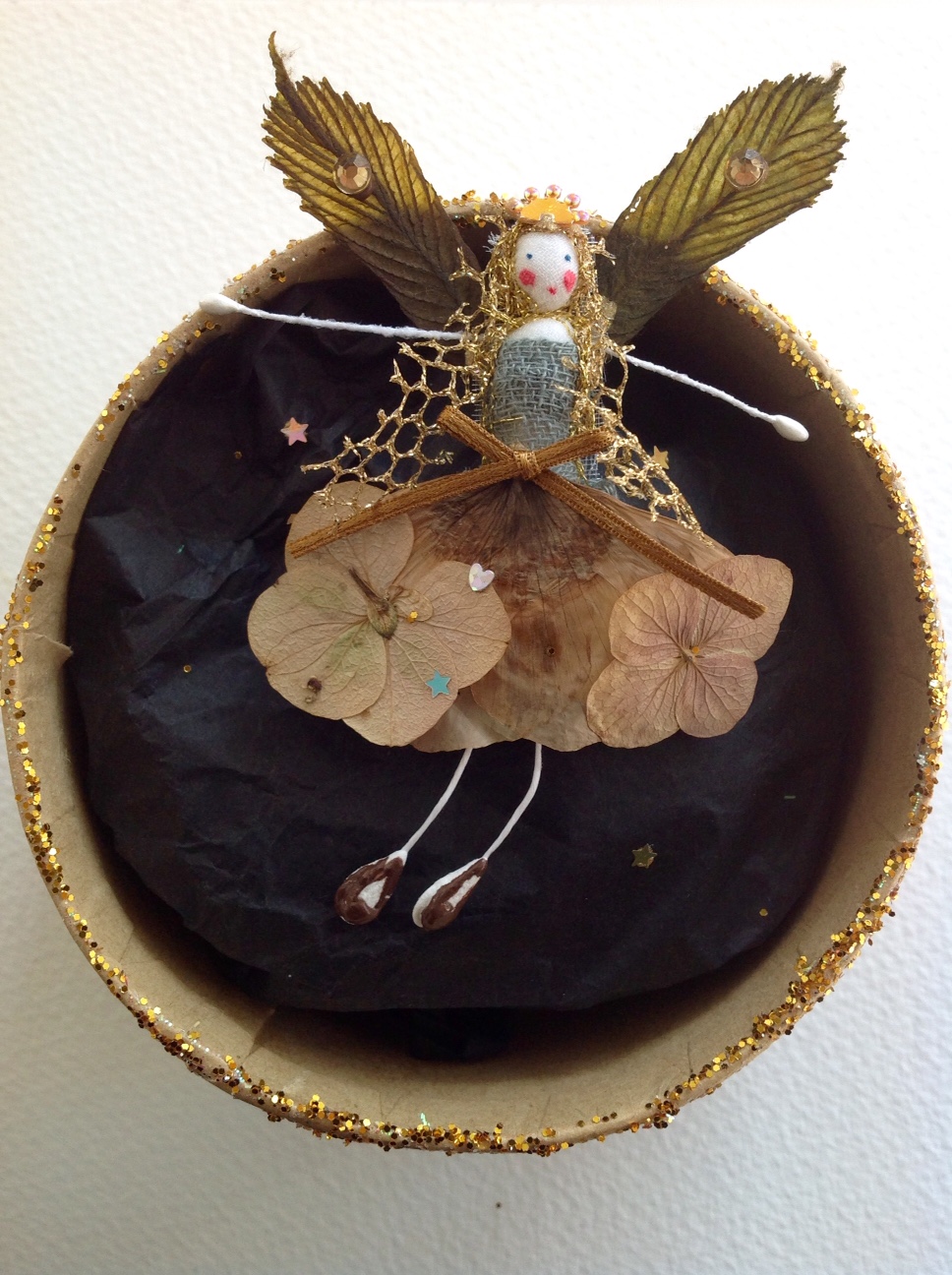 AUTUMN A 9cm fairy in a box with her name in the lid. Dressed in poppy and lace cap flowers and chestnut leaves. £15 plus £3.50 p&p