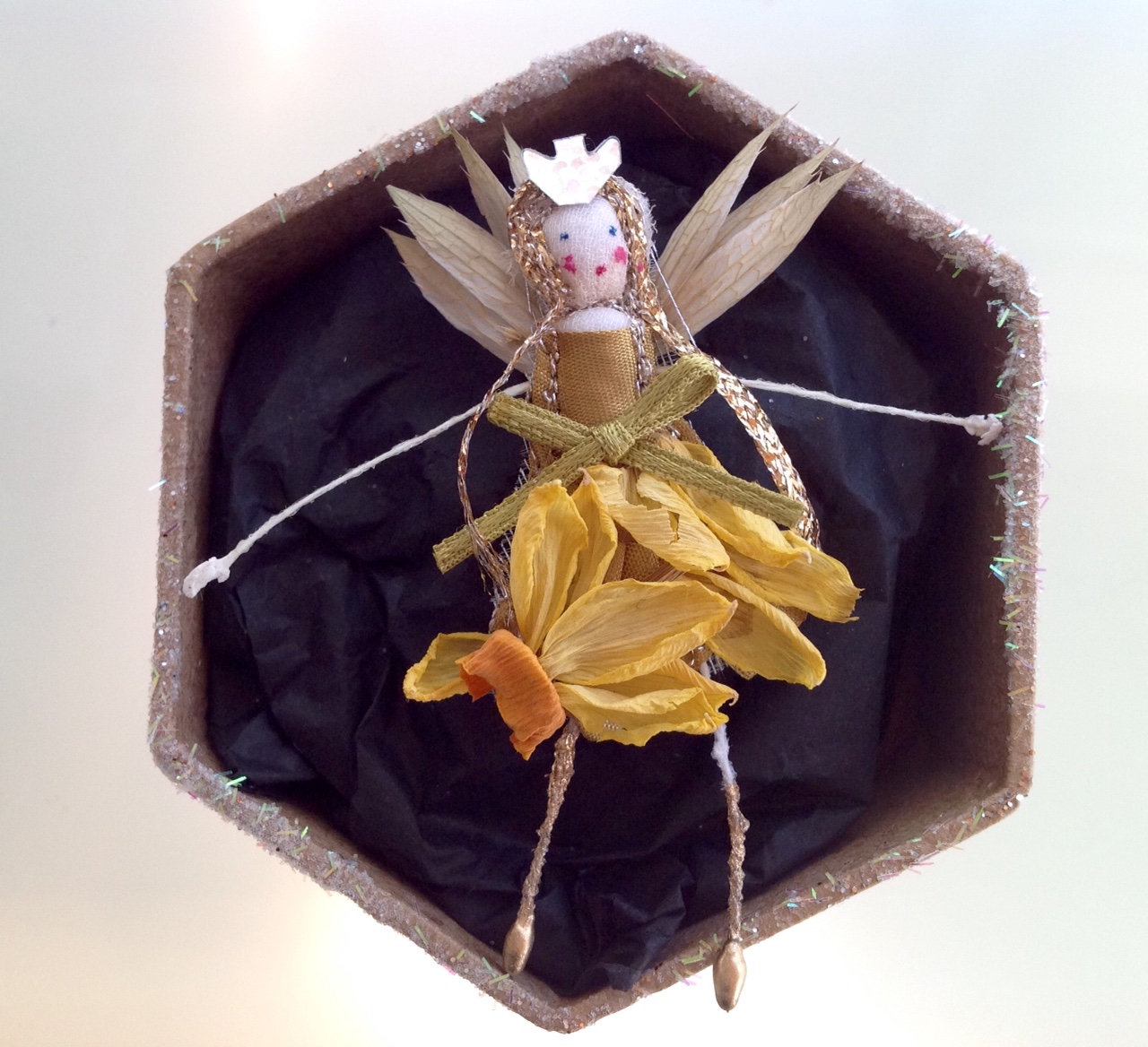 A 6cm boxed fairy with her name in the lid. Dressed in dried narcissus and astrantia. £12 plus £3.50 p&p.