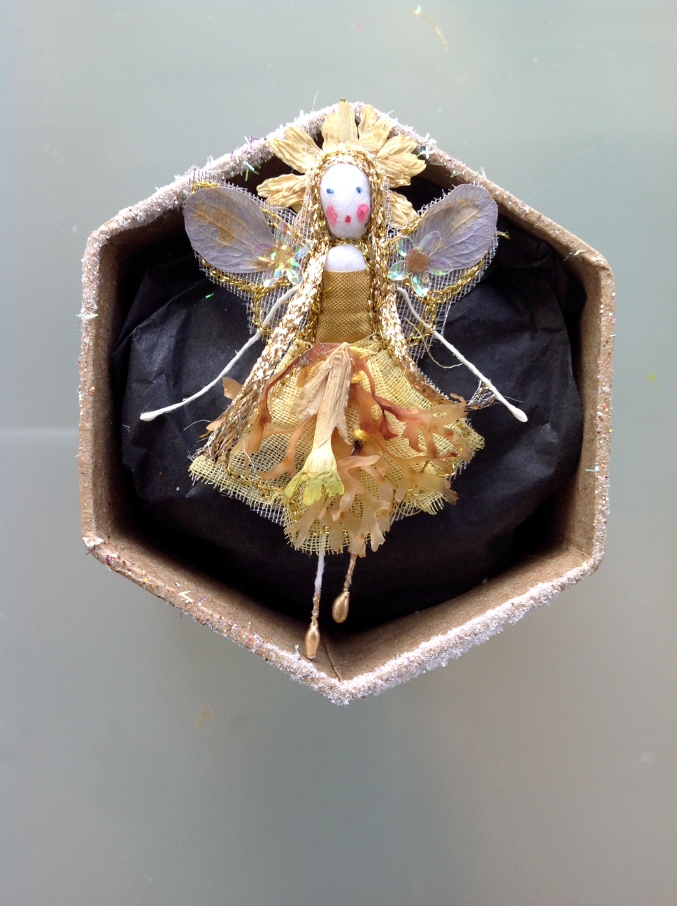 DAFFODIL A 6 cm fairy in a box with her name in the lid. Dressed in dried cowslip, daisy and seaweed. £12 plus £3.50 p&p.