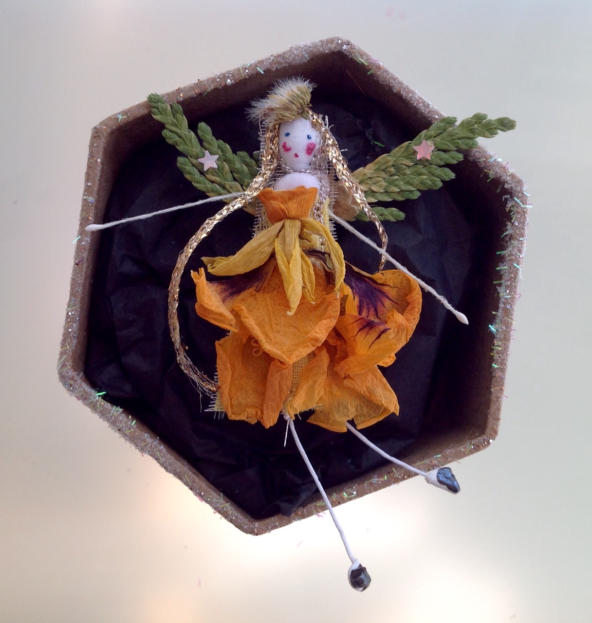 A 6 cm boxed fairy with her name in the lid. Dressed in dried nasturtium, narcissus and and cypress. £12 plus £3.50 p&p.