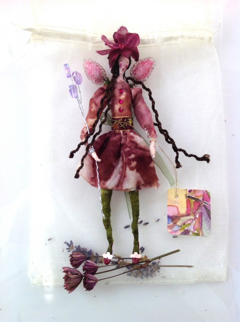 DAMSON; A 14 cm high fairy with a painted silk head. She is wearing an eco-dyed cotton organdie dress and comes with a hand painted name tag and in an organza bag with dried petals. £25 plus £2 p&p
