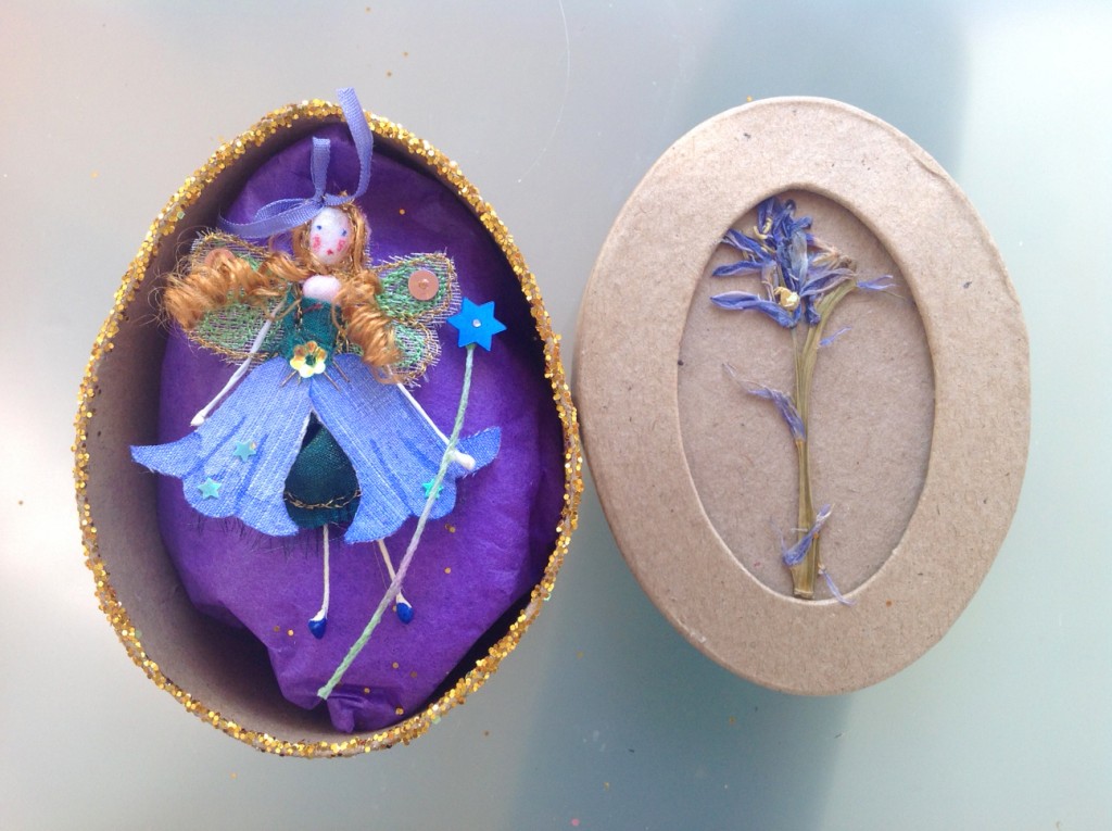 An 8cm oval boxed fairy with a hand painted silk bluebell dress with a fine silk ribbon, embellished with sparkles ad sequins. Her name is in the box lid which has a pressed bluebell on it's top. £11.50 plus £3.50 P&P.